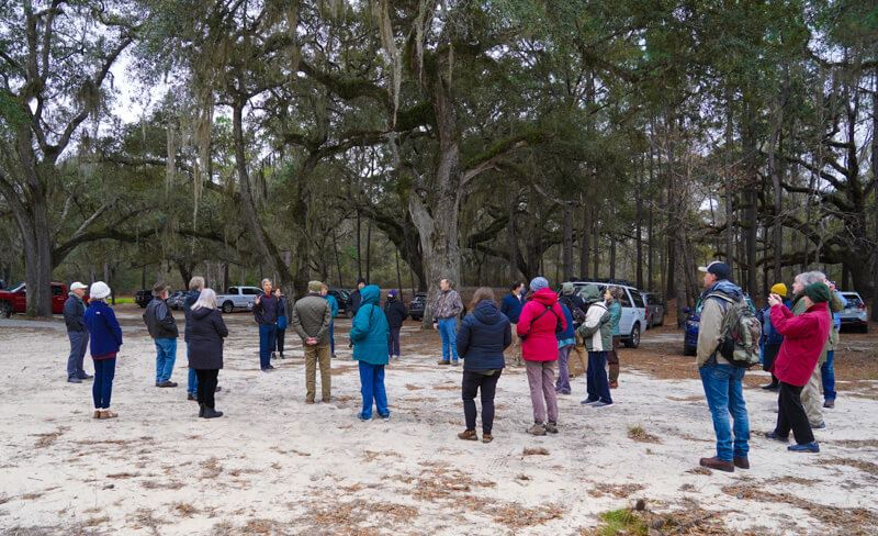 group meeting at Fort Barrington, GA with live oaks in background